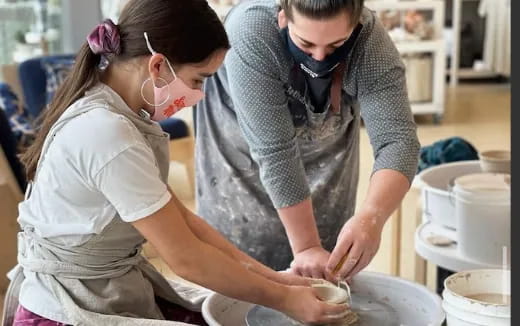 a man and a woman preparing food