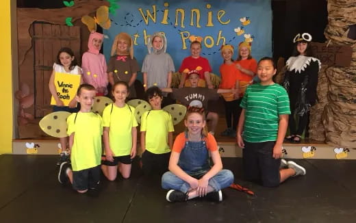 a group of children posing for a photo