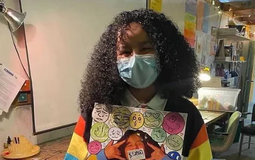 a person with a mask