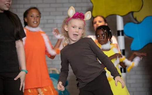 a group of children dancing