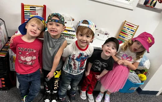 a group of children posing for a photo