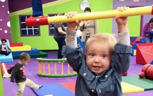 a child holding a bat