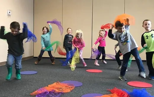 a group of children dancing
