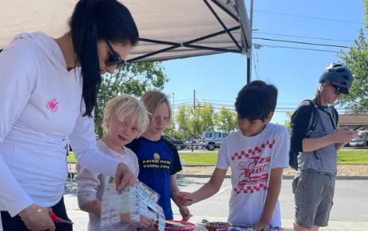 a person and several children