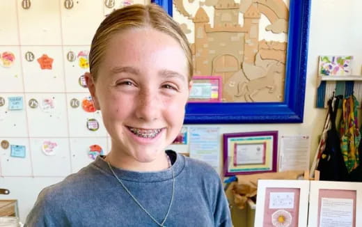 a person smiling for the camera