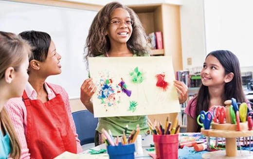 a teacher teaching her students