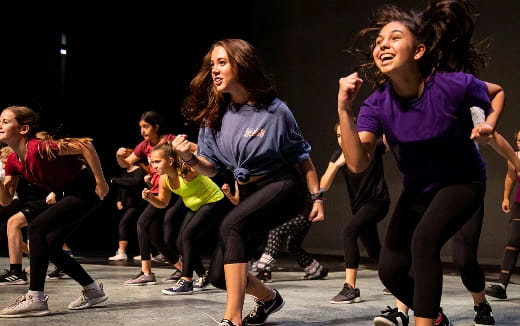 a group of girls dancing