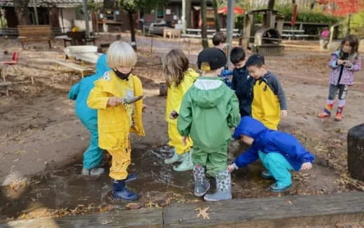 a group of children playing outside