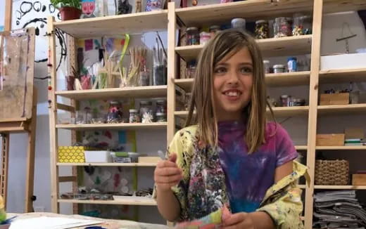 a person holding a pencil