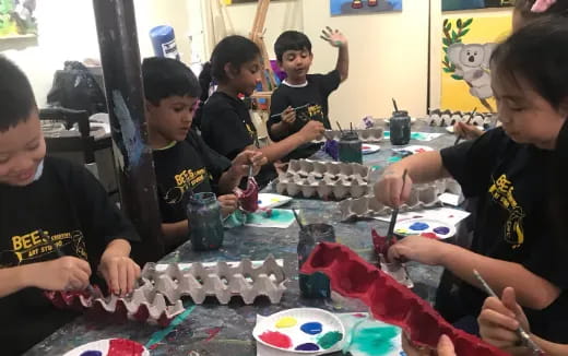 a group of kids playing with toys
