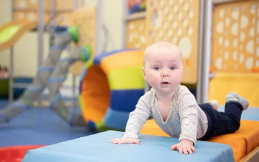 a baby sitting on a table