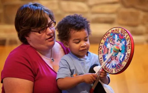 a man and a child painting