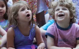 a group of children laughing