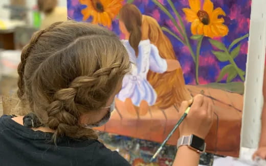 a person painting a picture