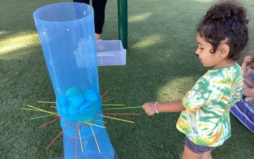 a child playing with a toy