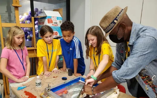 a person and a group of children