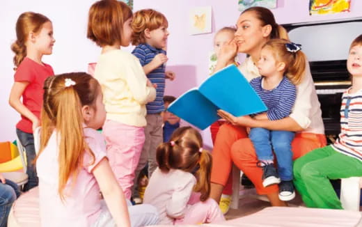 a group of children sitting on the floor