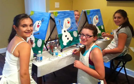 a group of girls in a classroom
