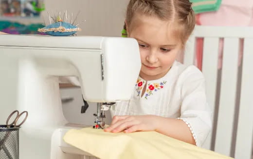 a child sitting at a table