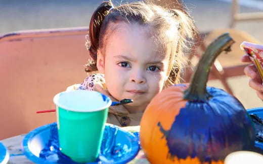 a child eating a fruit