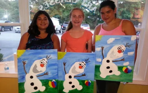 a group of women posing for a picture