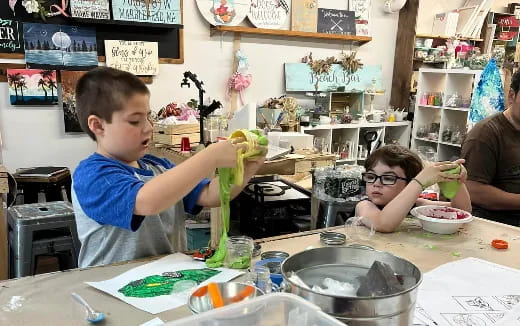 a couple of kids painting