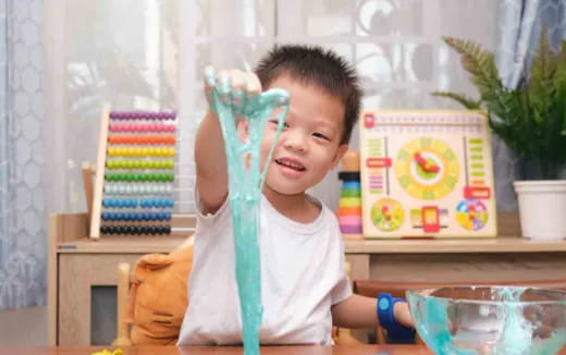 a child holding a toy