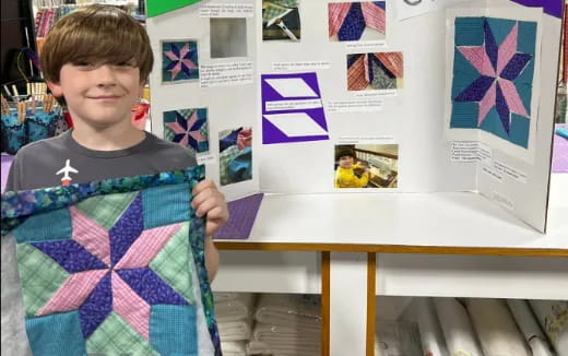 a boy holding a flag