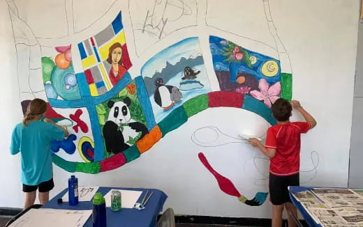 a couple of kids painting