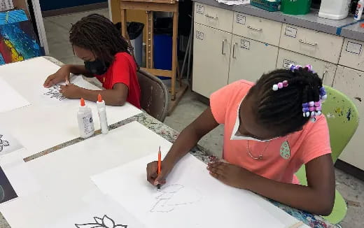 a young girl painting