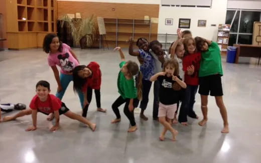 a group of children dancing