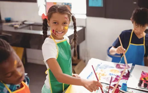 a young girl smiling