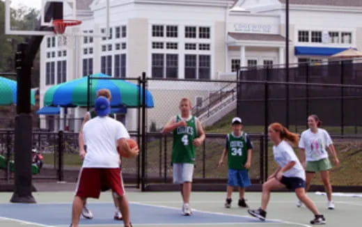 people playing with a frisbee