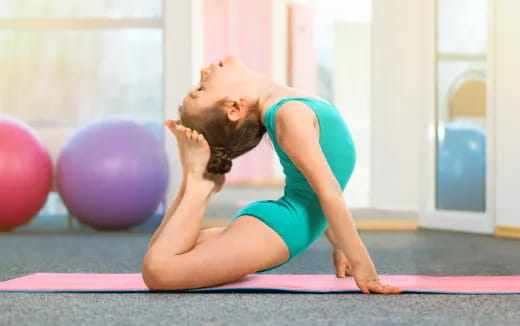 a woman stretching her hands