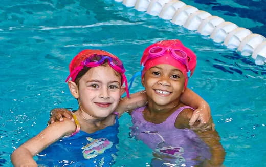 two girls in a pool