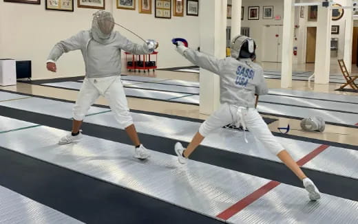 two people in white uniforms