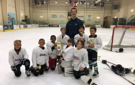 a group of people wearing hockey uniforms
