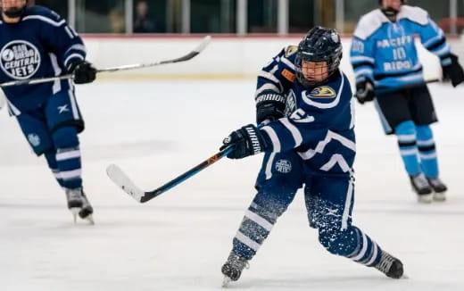 a group of men playing hockey
