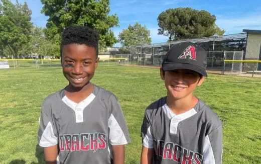 two boys standing together