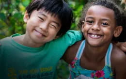 a boy and girl smiling