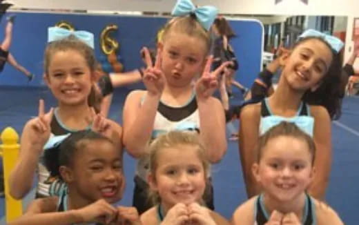 a group of girls in a swimming pool