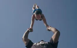 a man and a woman skydiving