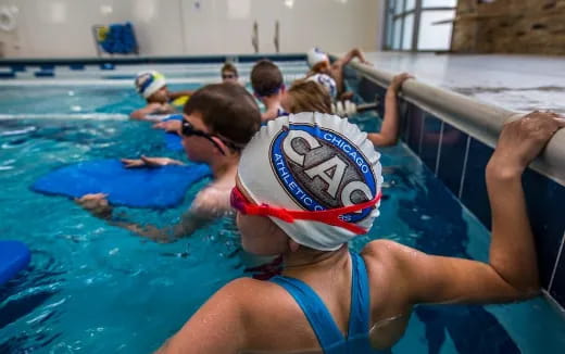 a group of people in a pool