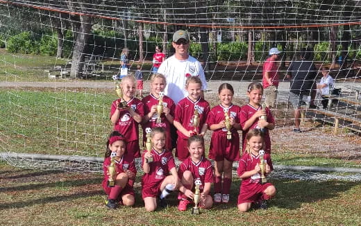 a group of children posing for a photo