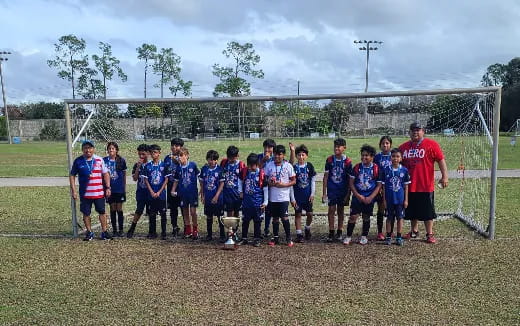 a group of people posing for a photo