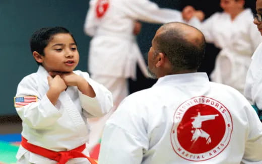 a group of people in white uniforms