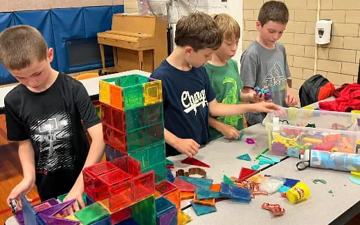 a group of boys playing with toys