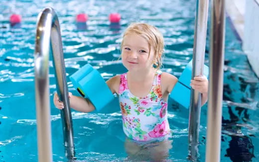 a girl in a pool