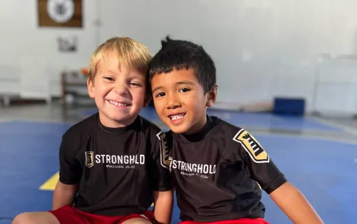 two boys sitting together