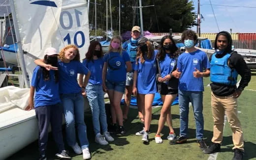 a group of people posing for a photo